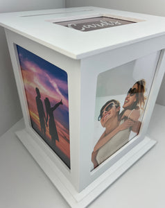 Engagement photos on display in our white wedding card holder with a dusty rose Cards print on box top