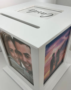 Wedding photos for wedding reception displayed in white rotating wedding card box.  Used for wedding receptions